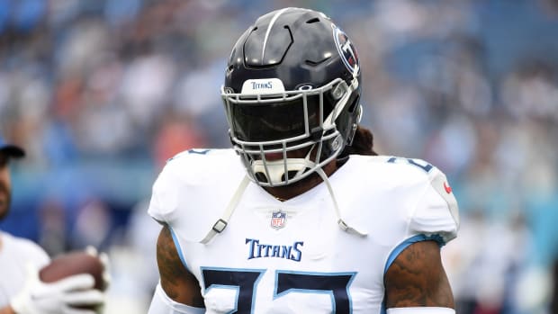 Sep 17, 2023; Nashville, Tennessee, USA; Tennessee Titans running back Derrick Henry (22) warms up before the game against the Los Angeles Chargers at Nissan Stadium. Mandatory Credit: Christopher Hanewinckel-USA TODAY Sports  
